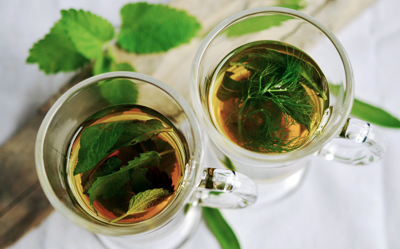Herbal lemon tea with mint leaves